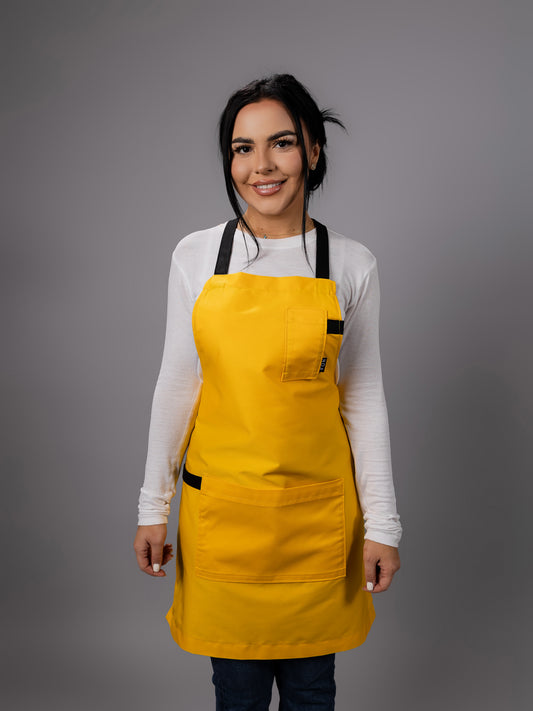 Șorț galben chef NOA cu bretele negre in X